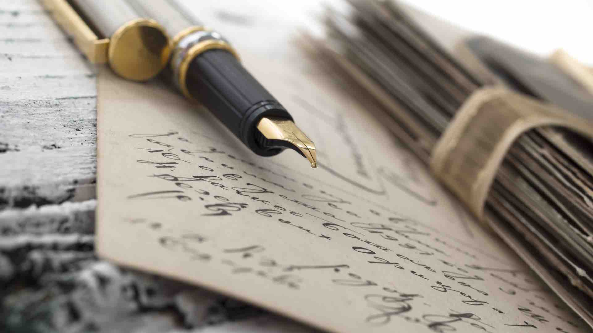 Image of a fountain pen and written work corresponding to the testimonial page